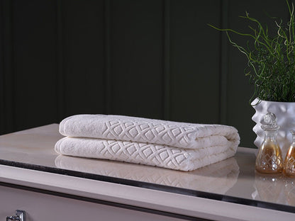 Luxury Bath Towel - Indulge in the ultimate comfort and style with our luxurious bath towel. Made from premium materials, this towel offers exceptional softness, absorbency, and durability. Elevate your bathing experience with this high-quality, plush towel.